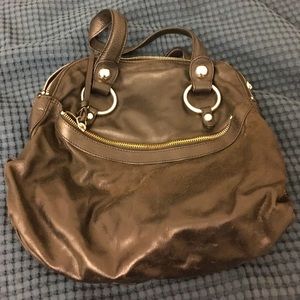 Leather bag with lots of zippers and pockets